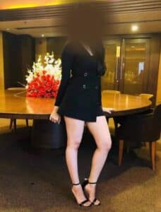 Standing Girl in a Sexy Pose at Black Attire